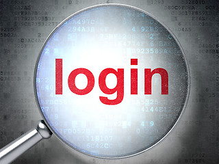 Image showing Magnifying optical glass with words login on digital background