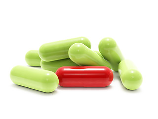 Image showing Red and green pills on white