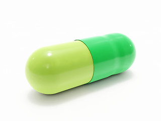 Image showing Green pill on white