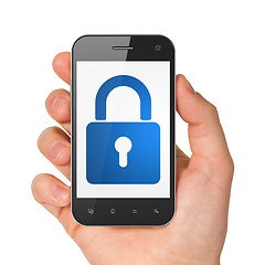 Image showing Hand holding smartphone with closed padlock