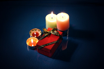 Image showing candles with gift box