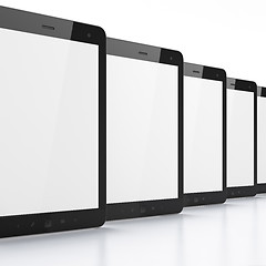 Image showing Black tablets on white background