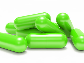 Image showing Many green shiny medical pills (capsule)