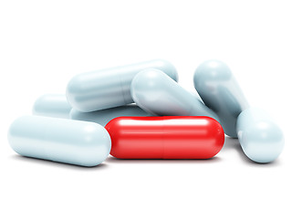 Image showing Many white and one red shiny pills (medical capsule)