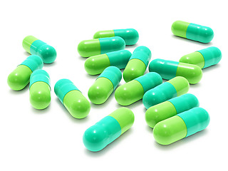 Image showing Many two-colored pills on white