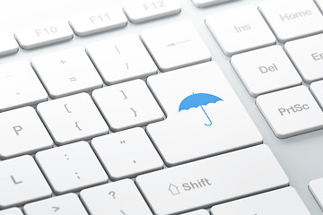 Image showing Safety concept: computer keyboard with Umbrella