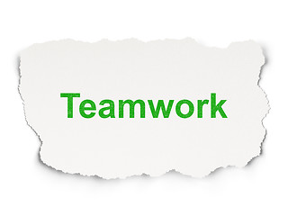 Image showing Torn paper with words Teamwork on  background