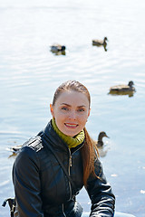 Image showing Woman against lake