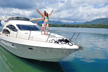 Image showing young couple on yacht