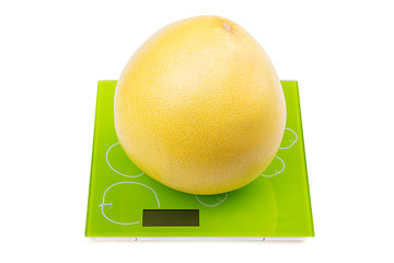 Image showing Pomelo fruit on square scales