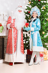 Image showing Snow maiden and santa claus