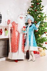 Image showing Santa claus and snow maiden