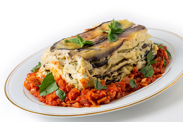 Image showing Vegetable lasagne and tomato sauce