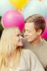 Image showing couple with colorful balloons