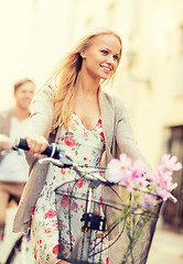 Image showing couple with bicycles in the city