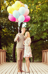 Image showing couple with colorful balloons