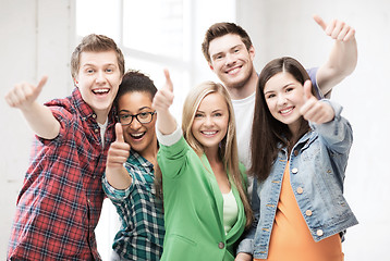 Image showing students showing thumbs up at school