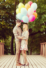 Image showing couple with colorful balloons