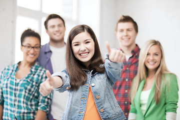 Image showing students showing thumbs up at school