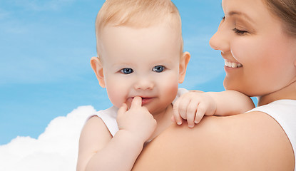 Image showing happy mother with adorable baby