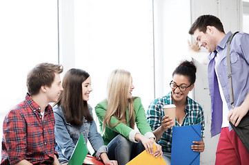 Image showing students communicating and laughing at school