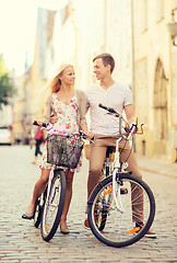 Image showing couple with bicycles in the city