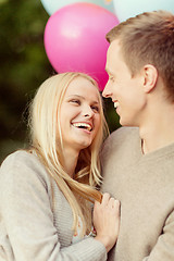 Image showing couple with colorful balloons