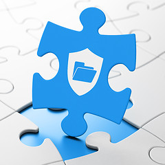 Image showing Business concept: Folder With Shield on puzzle background