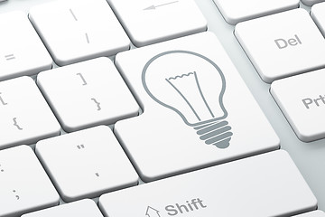 Image showing Finance concept: Light Bulb on computer keyboard background