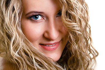 Image showing portrait of a beautiful young girl with long blond wavy hair