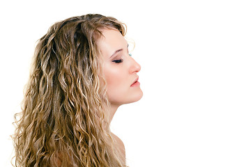 Image showing portrait of a beautiful young girl with long blond wavy hair
