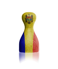 Image showing Wooden pawn with a flag painting