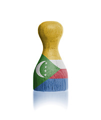 Image showing Wooden pawn with a flag painting