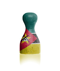 Image showing Wooden pawn with a flag painting