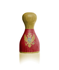 Image showing Wooden pawn with a flag painting