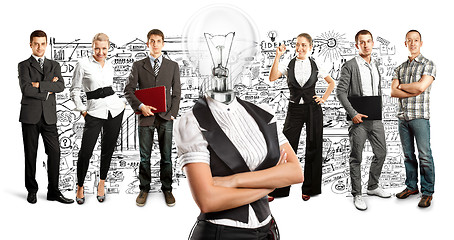 Image showing Business Team With Lamp Head