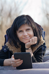 Image showing Woman with ebook