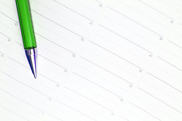 Image showing Color pencil and agenda