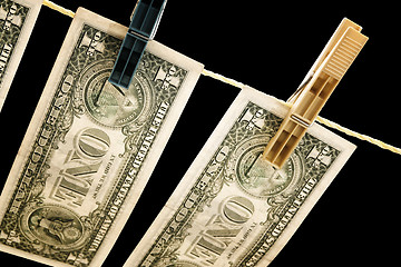 Image showing Dollars on the wire