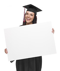 Image showing Female Graduate in Cap and Gown Holding Blank Sign