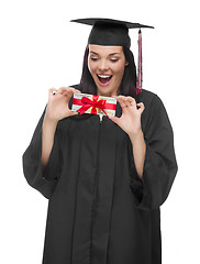 Image showing Female Graduate Holding Stack of Gift Wrapped Hundred Dollar Bil