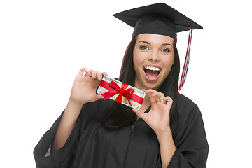 Image showing Female Graduate Holding Stack of Gift Wrapped Hundred Dollar Bil