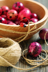 Image showing Wooden bowl with Easter eggs.