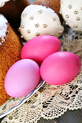 Image showing Easter eggs and cakes on a napkin.