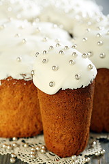 Image showing Easter cakes and silver beads.