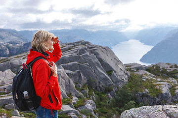 Image showing Woman hiker on Pulpit Rock / Preikestolen, Norway