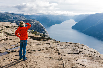 Image showing Woman hiker on Pulpit Rock / Preikestolen, Norway