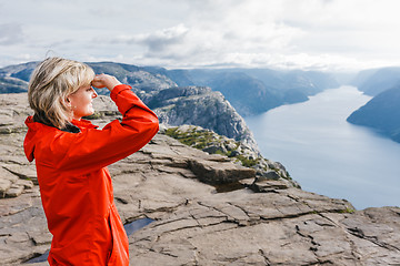 Image showing Woman hiker on Pulpit Rock / Preikestolen, Norway