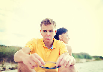 Image showing stressed couple outside