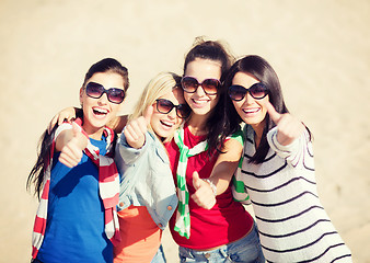 Image showing teenage girls or young women showing thumbs up